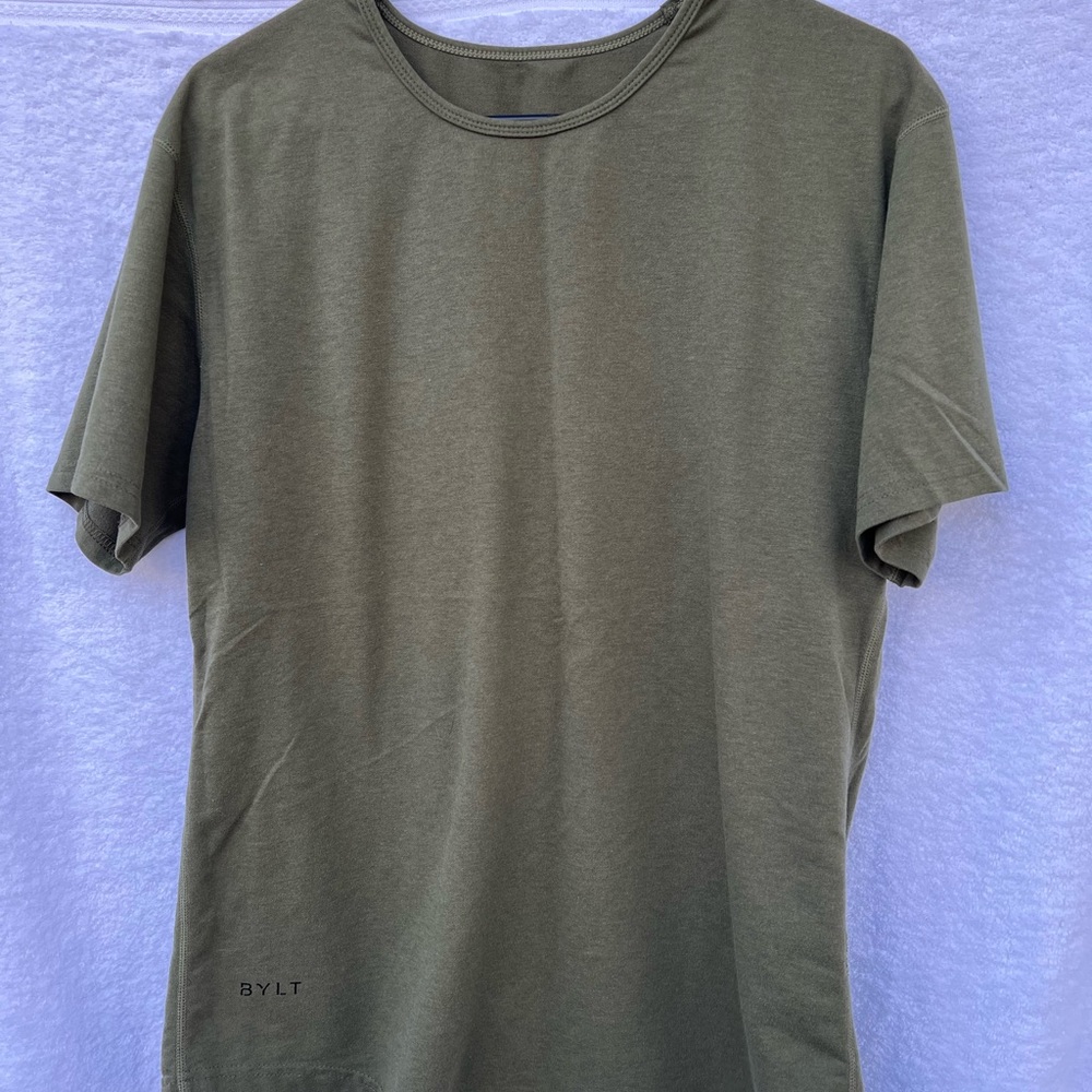 Wore a few time. Green olive